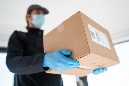 Man delivering a parcel to customer