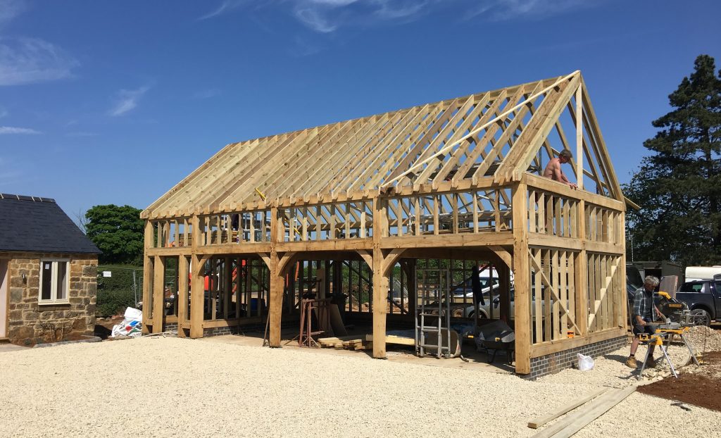 An image of a timber framed building by Oaksmiths Ltd